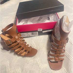 Gently worn Vince Camuto gladiator sandals .. No stains or scratches.